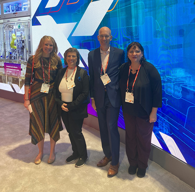 The Automation.com team visits a booth at Automation Fair. From left to right: Melissa Landon (content editor), Renee Bassett (chief editor), Chris Nelson (account executive) and Gina DiFrancesco (account executive).