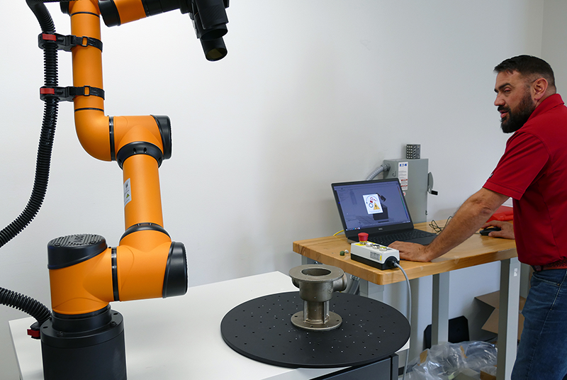 Phil Rediger runs the GOM ScanCobot.