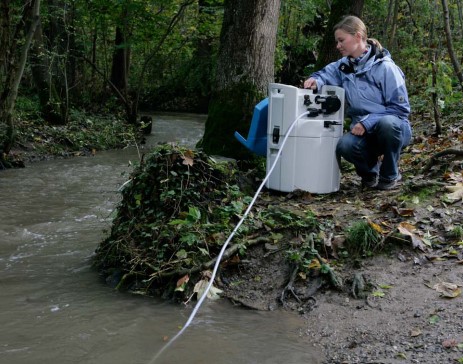 Figure 1: Traditional methods for monitoring surface water require  researcher travel to challenging sites, which is expensive and leads  to incomplete data.