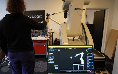 Fuzzy Logic and CAIRE: On the Way to Automating the Painting Process