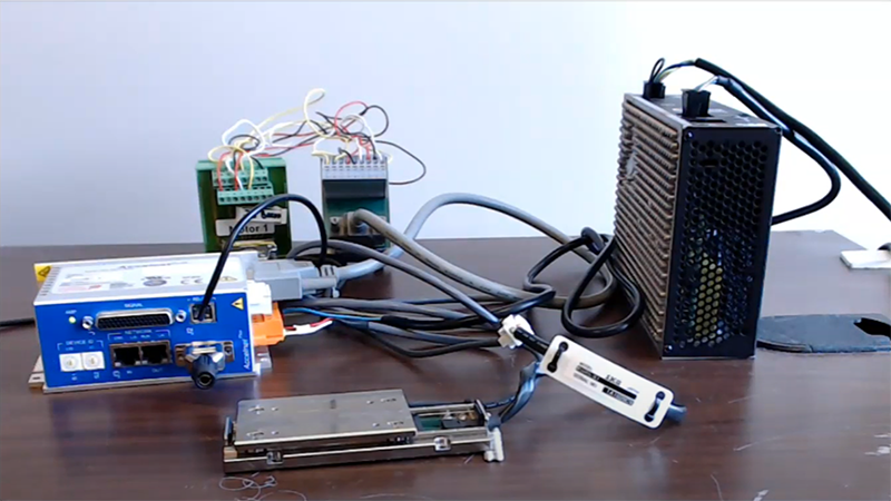 Figure 3: A demonstration consisting of an IKO NT-55-V-25/5L two-axis (X and Y) stage, an Accelnet Plus Panel digital servo drive with 250-microsecond position loop update rate, an 80V power supply and a USB to serial RS-232 adapter.