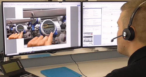 Figure 1: Using an augmented reality application, support engineers can see everything the technician sees in the field, and then guide troubleshooting or maintenance efforts using a virtual pencil to highlight target components for the technician.