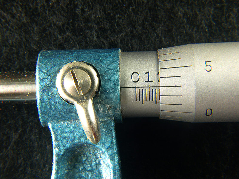 Figure 1: One way that operators can monitor tool wear is by measuring between every cut manually.