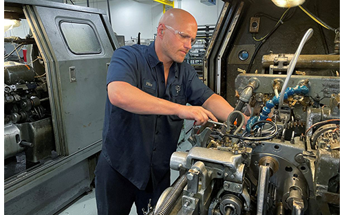 Omicron Restrains U.S. Manufacturing, Supply Bottlenecks Slowly Easing