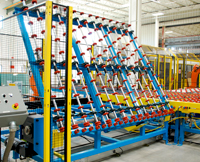 QComp introduces glass handling conveyors