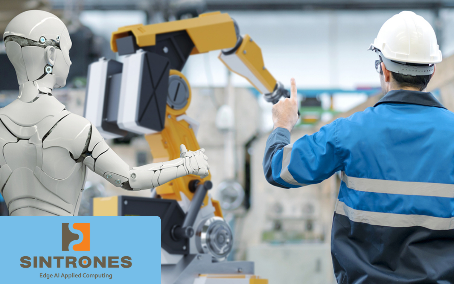 Worker and humanoid robot working together on the factory floor