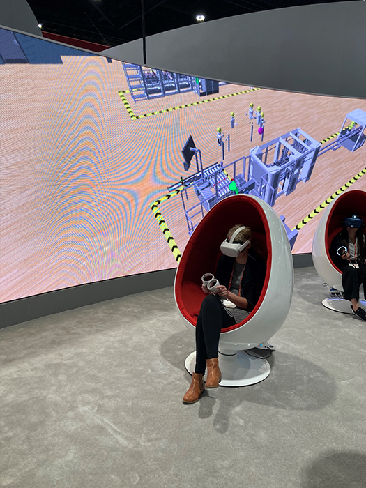 Melissa Landon takes a factory tour using virtual reality at Automation Fair.