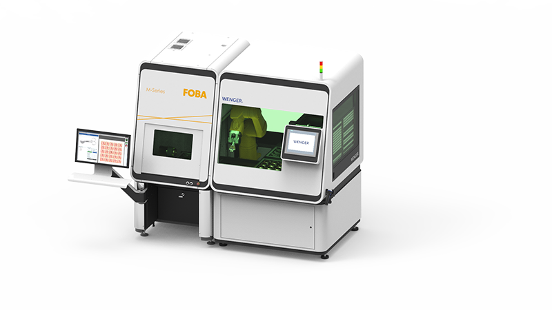 Figure 2: Image rights: Wenger Automation & Engineering AG Wenger docking modules perfectly complement FOBA's laser marking stations. Loading is carried out by automated tablet feed or integrated robotic gripper arm.
